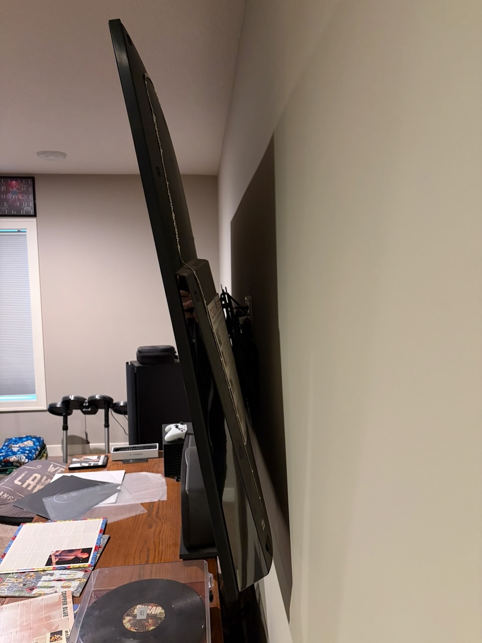 Space behind the TV and the wall