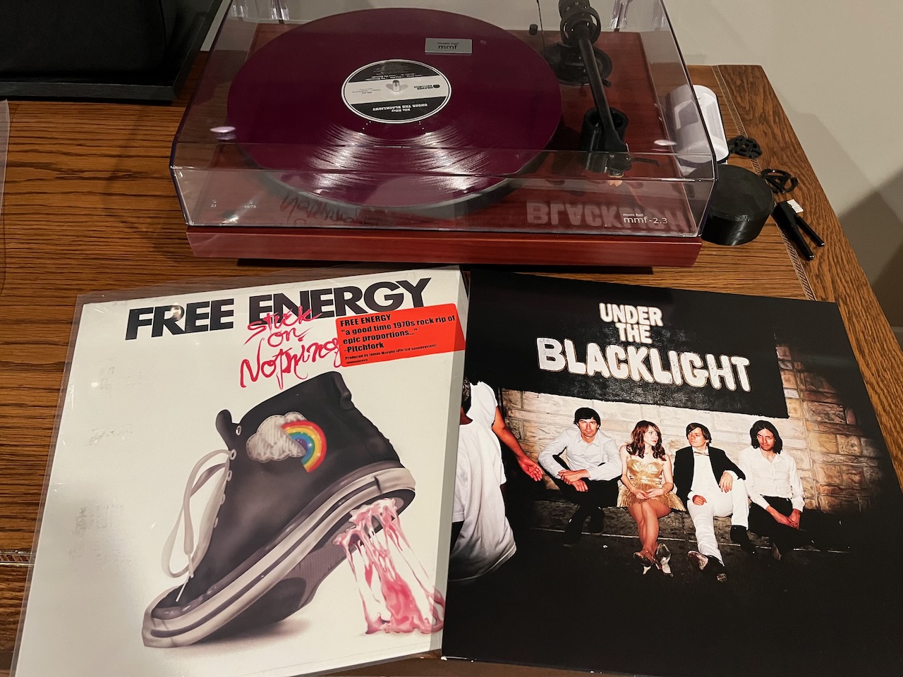 In front of my record player lay two albums, on the left Free Energy’s Stuck on Nothing and on the right, Rilo Kiley’s Under the Blacklight